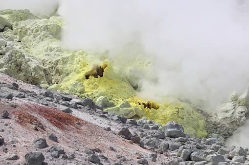 Sulphur pieces on Iozan (sulfur mountain) active volcano area, Akan National Park, Hokkaido, Japan