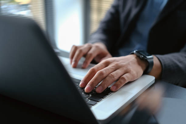 istock Select focus on businessman hands typing on laptop, searching information or checking financial data. 1591589981