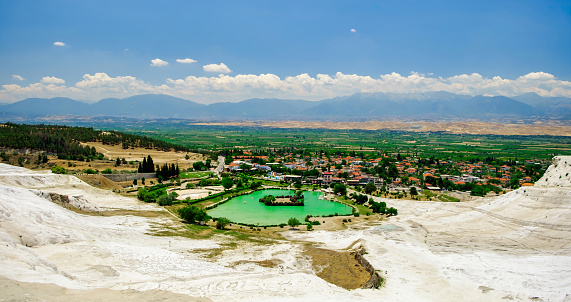 Landscape Panorama of a beautiful lake in bottom of Cotton castle. Famous Pamukkale and Hierapolis - Cotton Castle without the crowd download photo