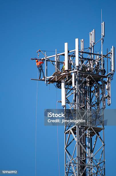 Maintenance Of A Communications Tower Stock Photo - Download Image Now - Communications Tower, Repairing, Antenna - Aerial