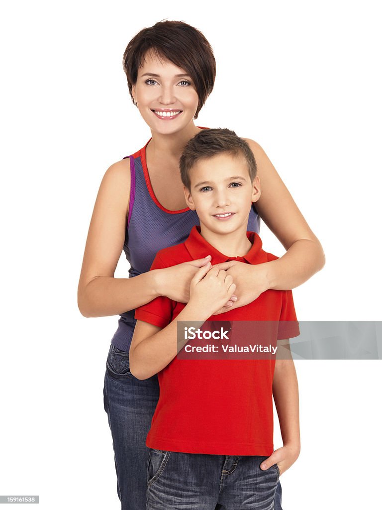 Portrait of a happy young mother with son Portrait of a happy young mother with son 8 year old over white background 25-29 Years Stock Photo
