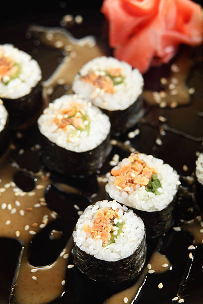 istock fresh and tasty sushi in black dish 159164024