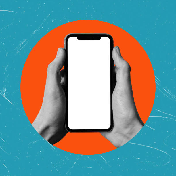istock Cell phone with white screen in hand, and orange circle and blue background. 1591648456