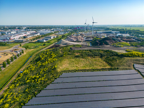 Drone point of view heavy industry with sustainable energy sources.  drone shot.
