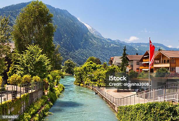 River Between Houses And Trees In Interlaken Switzerland Stock Photo - Download Image Now