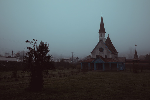 Foggy landscape church in south Chile\nValdivia province