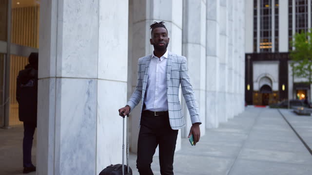 Affluent black businessman on a trip to NYC
