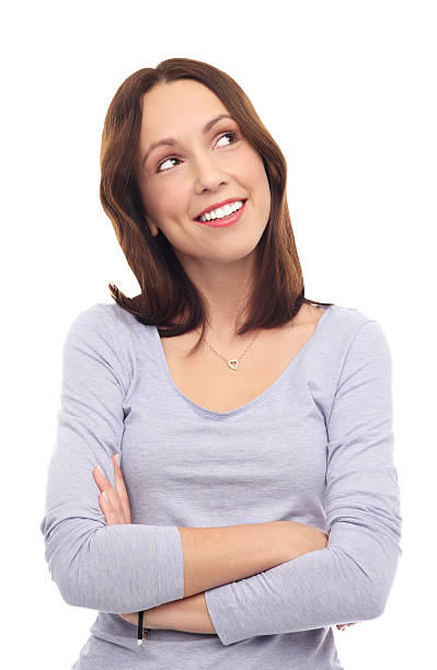 istock Young woman looking up 159171356