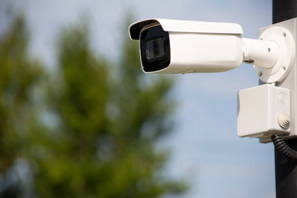 istock Outdoor surveillance camera on a pole 1591718432