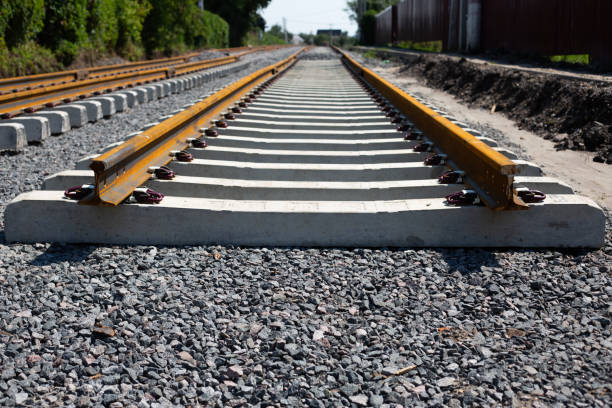 Rusty rails finish their way, the end of the railway track Rusty rails finish their way, the end of the railway track. Repair and laying of new sleepers and rails derail stock pictures, royalty-free photos & images