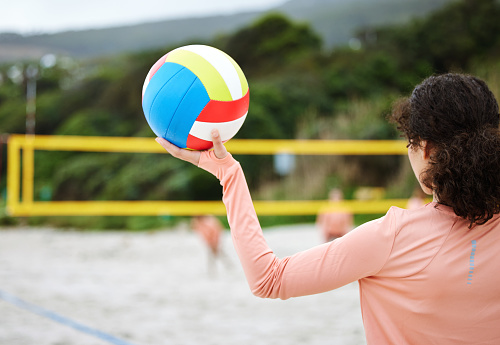 Volleyball, beach body or hand of girl playing a game in training or team workout in summer together. Sports fitness, zoom or healthy woman on sand ready to start a fun competitive match in Brazil