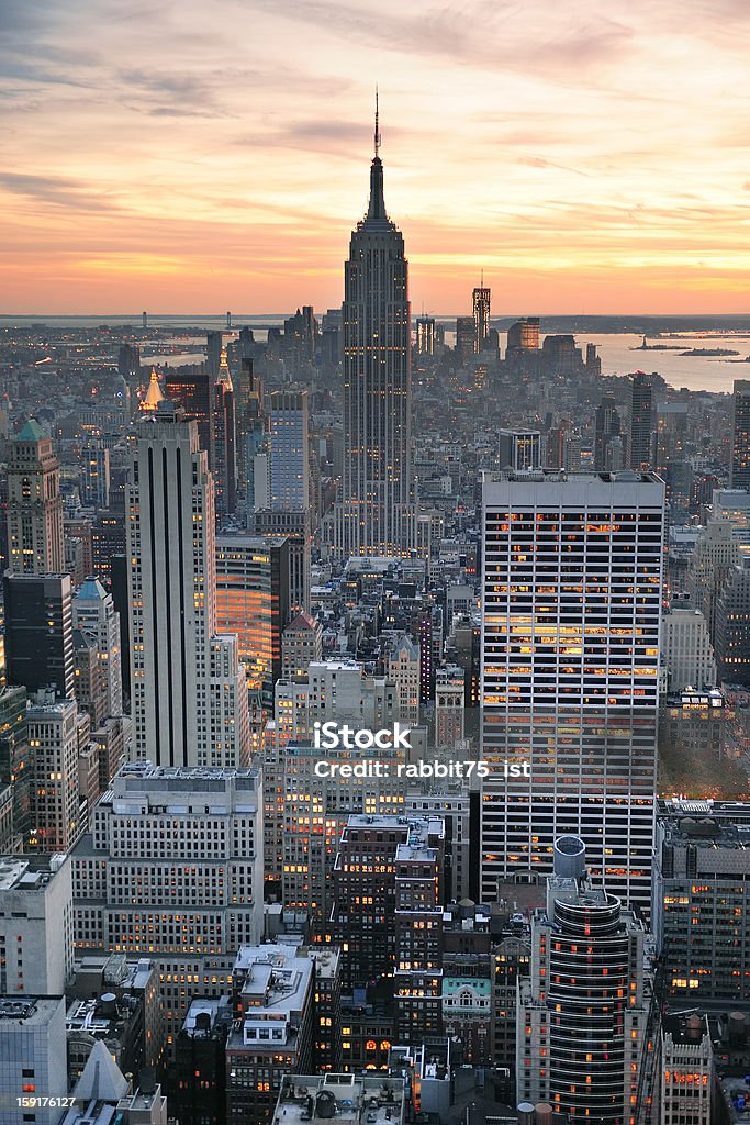 New York City sunset New York City skyline aerial view at sunset with colorful cloud and skyscrapers of midtown Manhattan. Aerial View Stock Photo