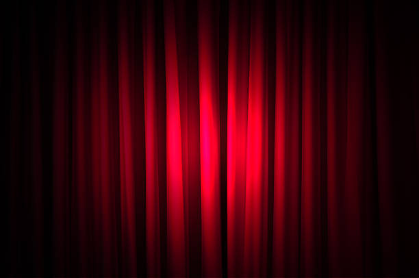 istock Brightly lit curtains in theatre concept 159176582
