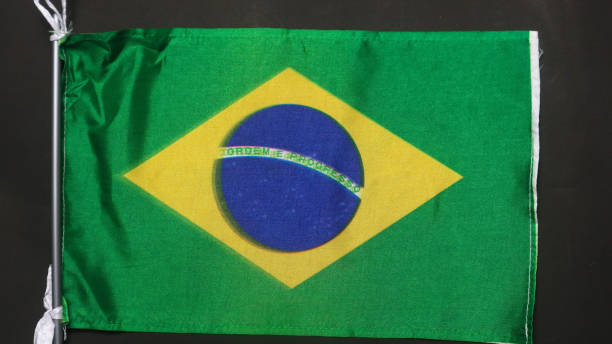 istock Brazilian flag texture as background 1591792754