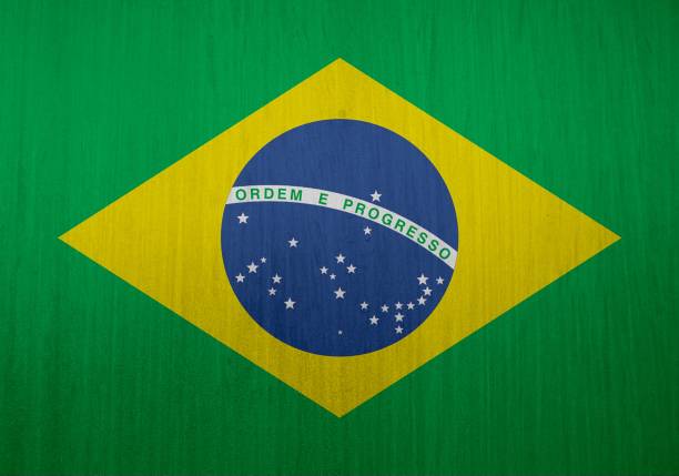 istock Brazilian flag texture as background 1591792760