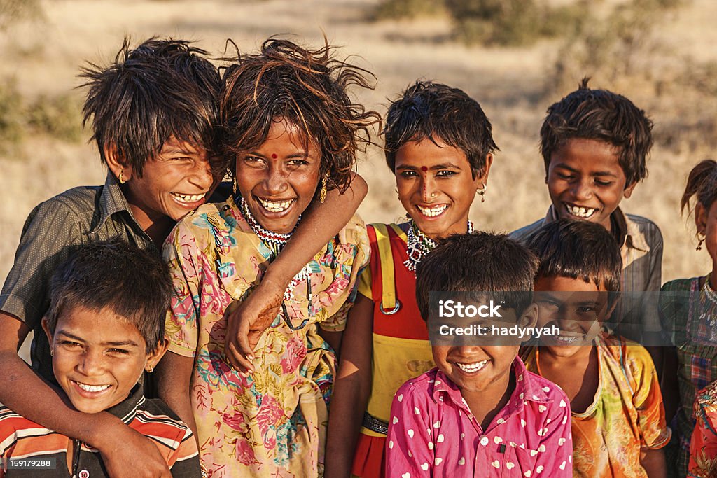 Group of happy Indian children, desert village, India Group of happy Gypsy Indian children - desert village, Thar Desert, Rajasthan, India.http://bem.2be.pl/IS/rajasthan_380.jpg 4-5 Years Stock Photo