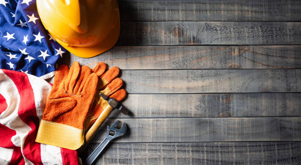 istock Happy Labor day concept. American flag with different construction tools on dark wooden background, with copy space for text. 1591814854
