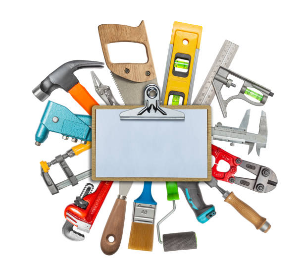 istock Set Of Various Construction Hand Working Tools Behind Clipboard With Copy Space Ssolated. DIY Hardware Store Equipment 1591820076
