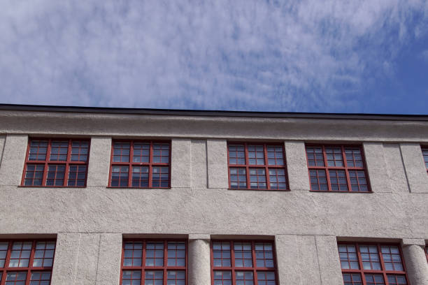 istock Low angle view of building against blue sky 1591823523