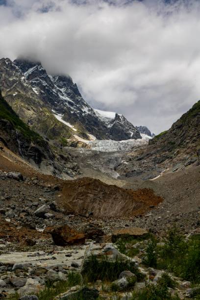 istock Stunning landscape featuring a towering mountain situated on the Chalaadi Trail in Georgia 1591830566