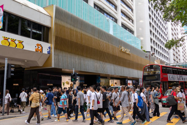 canton road in tsim sha tsui, hongkong - clothing store store prada outdoors stock-fotos und bilder
