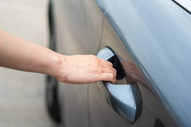 istock Unlocking and opening the car door. 1591892689