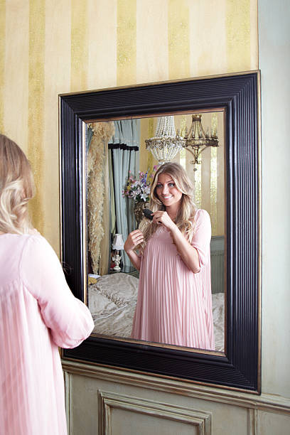 istock beautiful women in mirror 159189908
