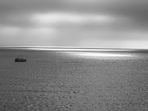 A lone fishing vessel in the North Sea off the coast at Whitley Bay
