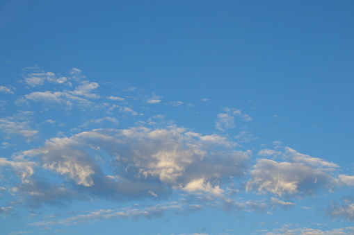 Clouds ground and sunlight on cloud with light blue sky background