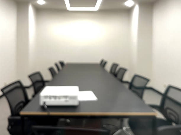 istock Meeting Conference Room Blur Background, Brightly Lit Modern Office Defocused Presentation Background 1592002290