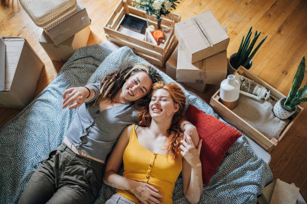 istock Couple relaxing in new apartment 1592024486
