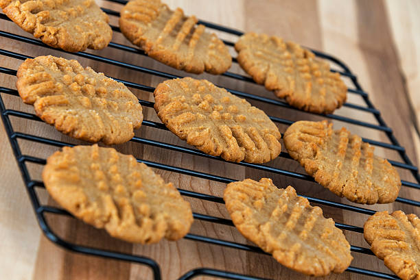 istock Peanut butter cookies cooling on rack 159203666