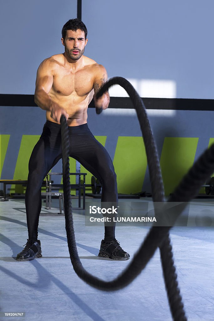 gym battling ropes at gym workout exercise gym battling ropes at gym workout fitness exercise Rope Stock Photo
