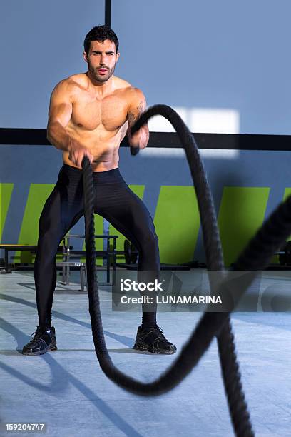 Gym Battling Ropes At Gym Workout Exercise Stock Photo - Download Image Now - Rope, 20-29 Years, Active Lifestyle