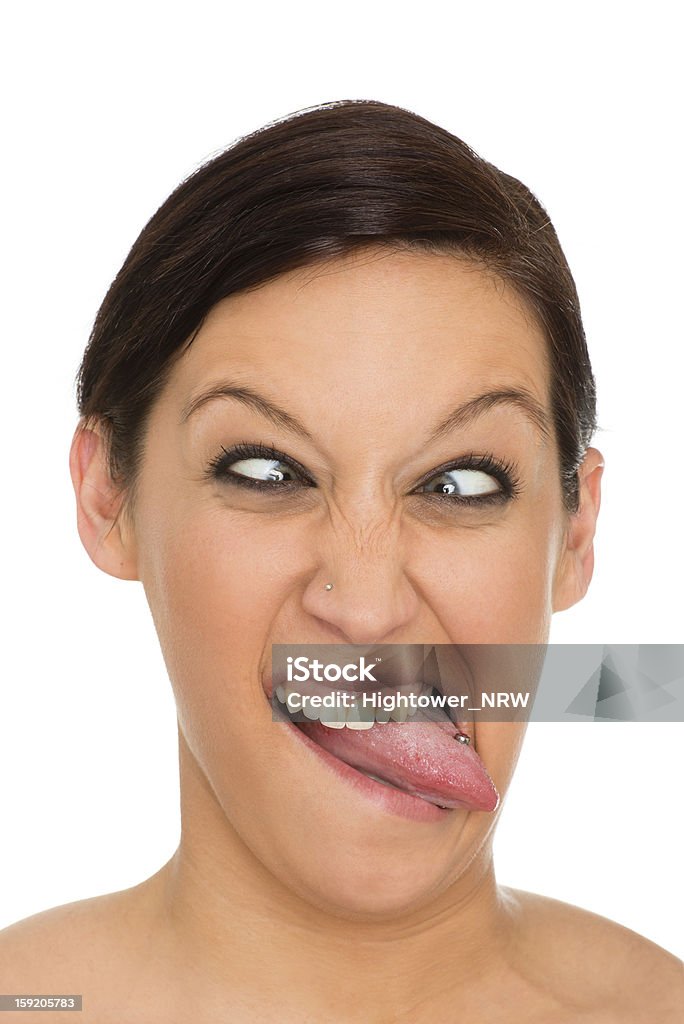 grimace beautiful young woman is showing a grimace Adult Stock Photo