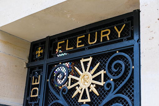 FLEURY-DEVANT-DOUAUMONT, FRANCE - JANUAR 05, 2020 : ironwork of the door of the Saint-Nicolas chapel, Notre-Dame-de-l'Europe, near Verdun in First World War One