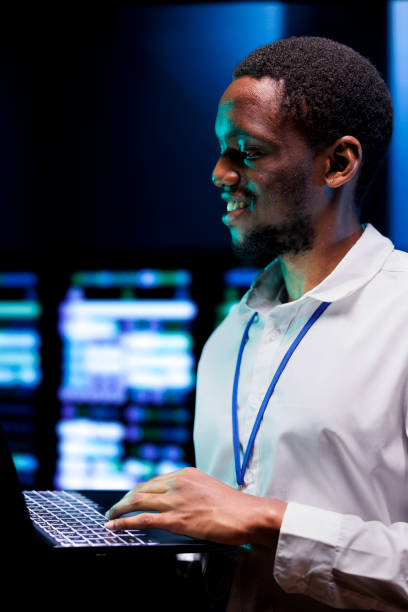 istock Supervisor monitoring server racks 1592101359
