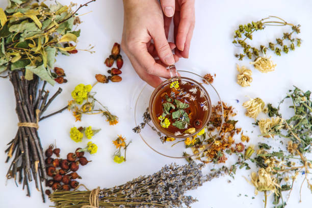 istock Herbal tea with medicinal herbs and flowers. Selective focus. 1592118448