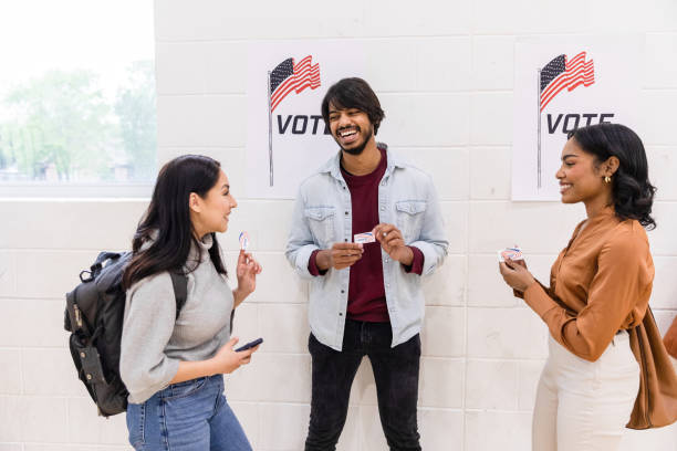 istock Diverse college students display 'I Voted' stickers 1592139275