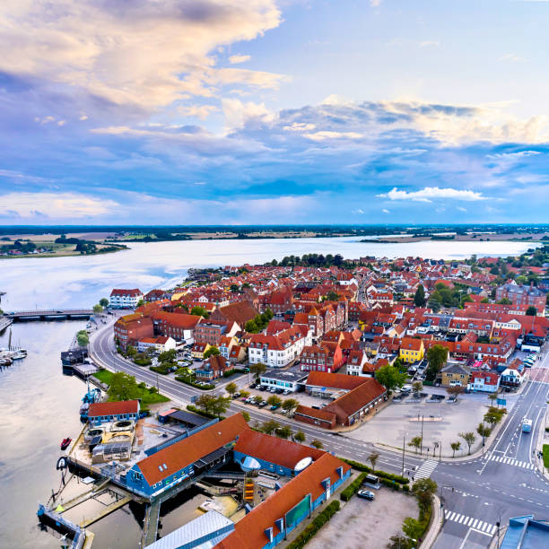 istock Small old town with harbor near inlet 1592139284