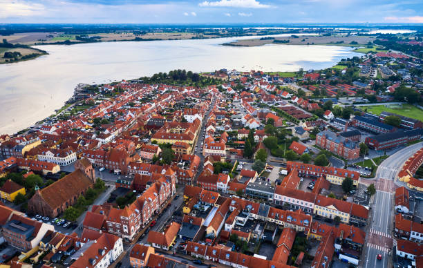istock Small old town with harbor near inlet 1592144900