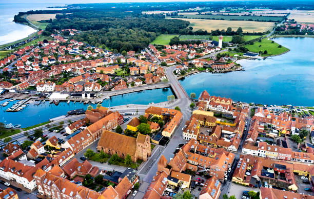 istock Small old town with harbor near inlet 1592146514