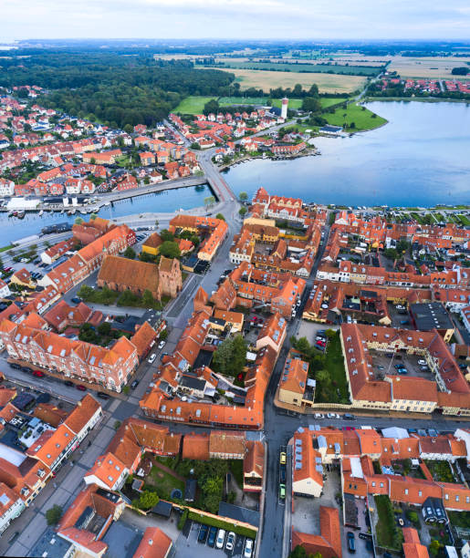 istock Small old town with harbor near inlet 1592147028