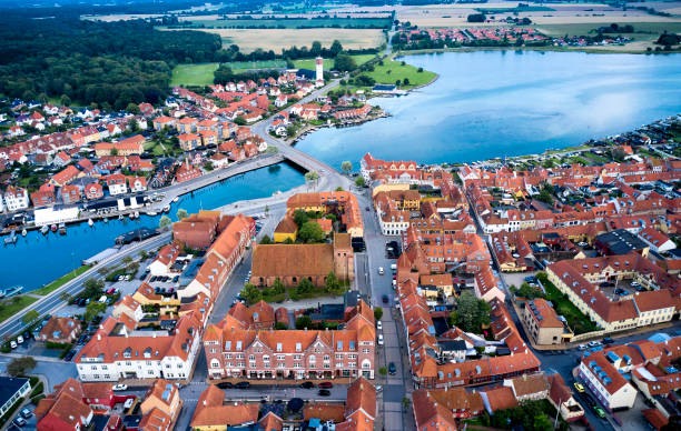 istock Small old town with harbor near inlet 1592148090