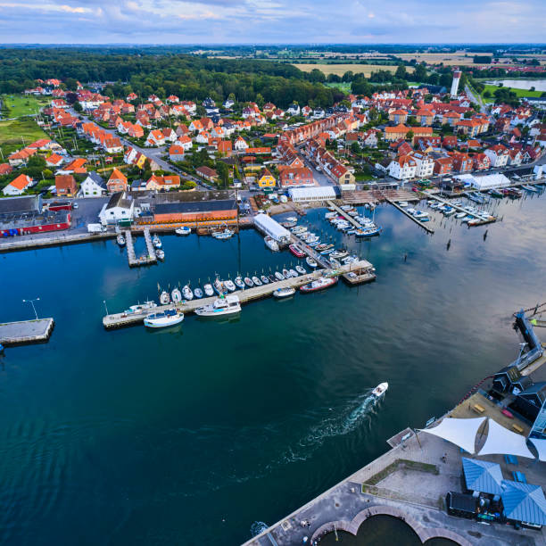 istock Small old town with harbor near inlet 1592148122