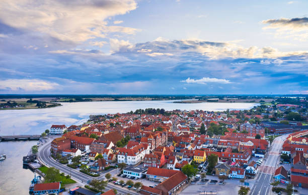 istock Small old town with harbor near inlet 1592148646