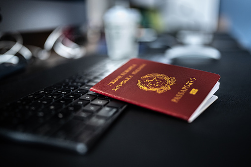 Italian passport at desk
