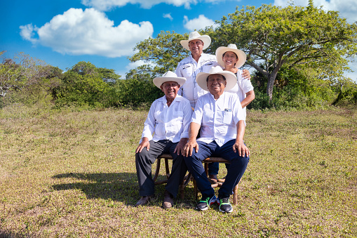 Ranch family wearing their hats