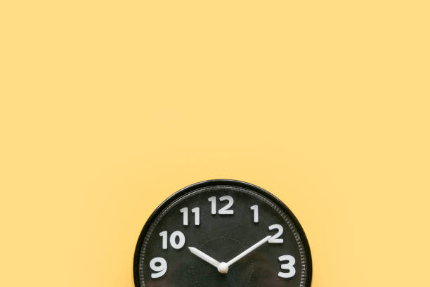 istock Concept of time, reminder, countdown, alert, deadline. Wall clock isolated on yellow background.Copy space. 1592176833