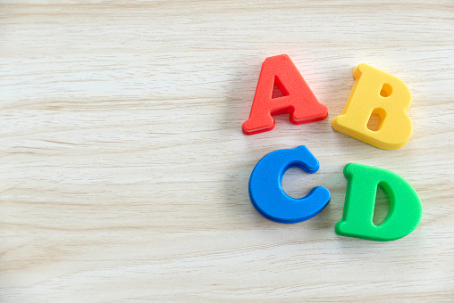 Wooden blocks with letters A B C.